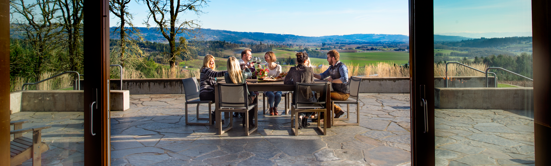 Folks on a patio in Penner-Ash