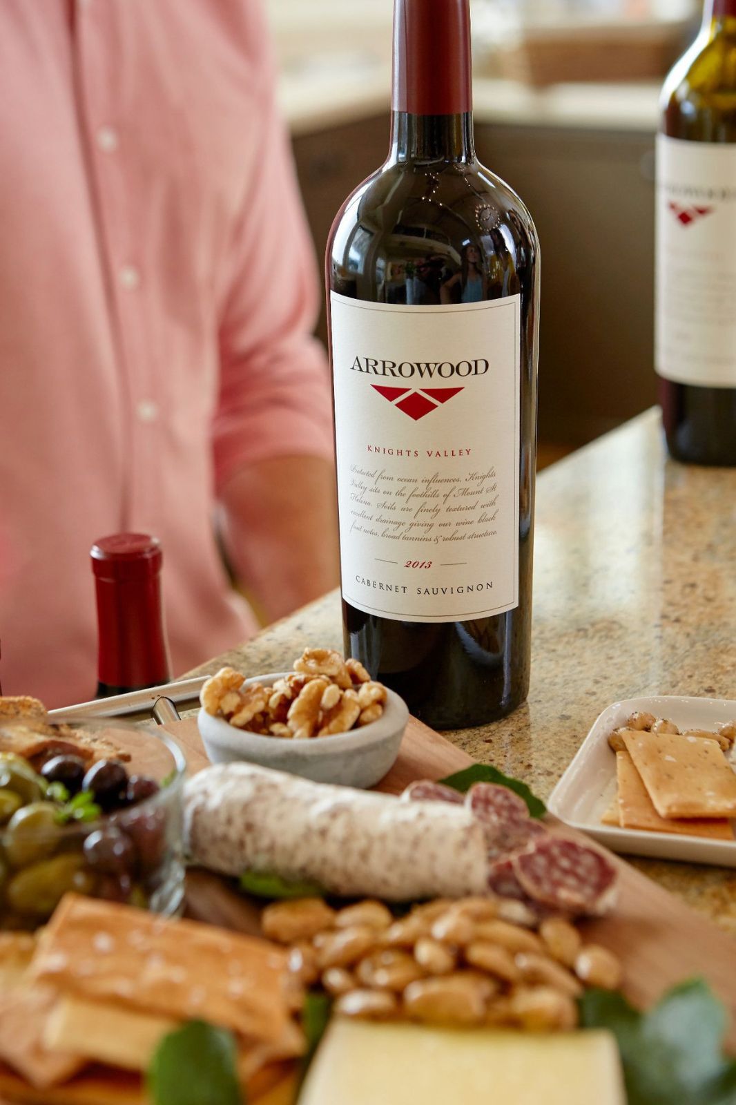 Arrowood Cabernet Sauvignon on table with cheese board