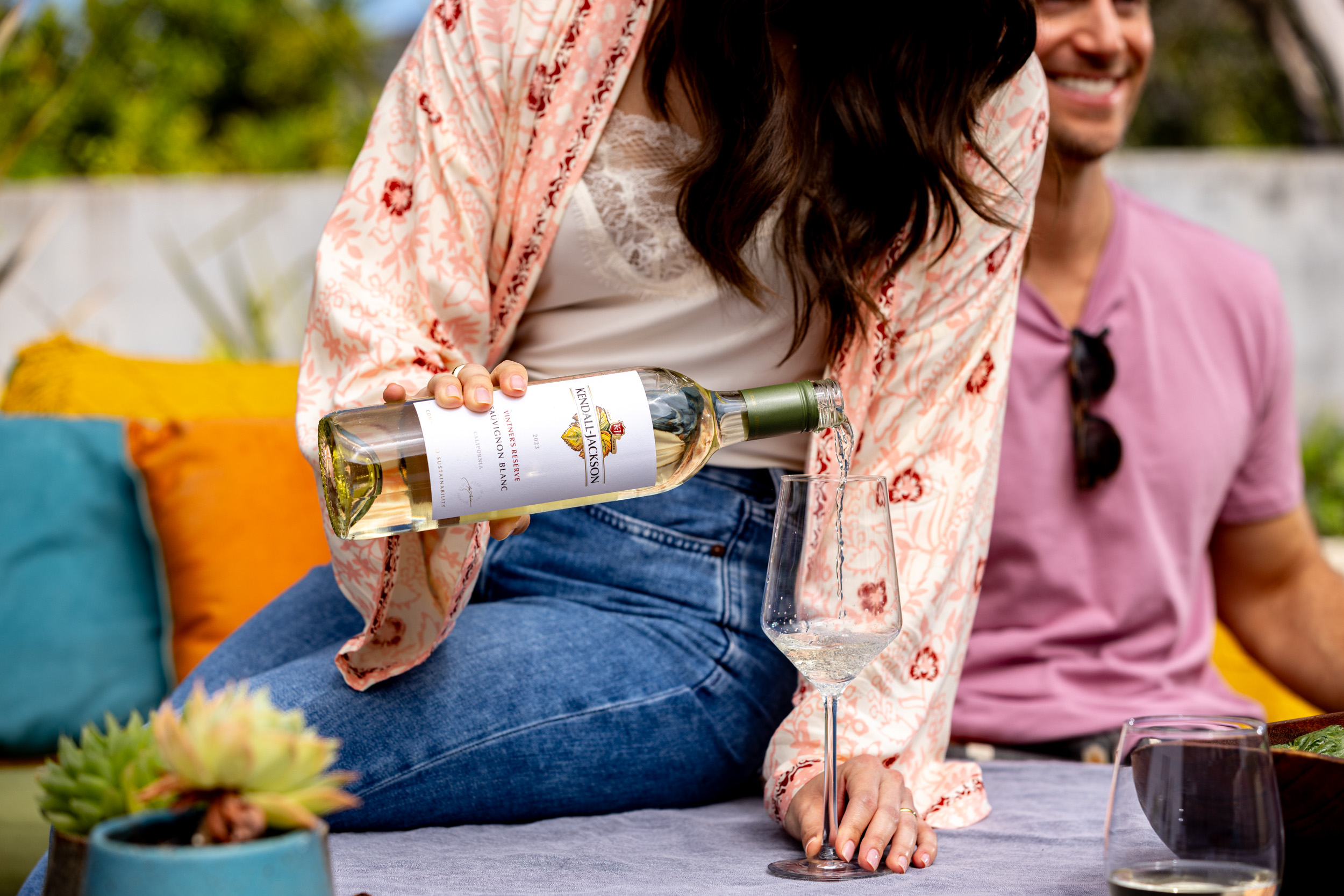 Pouring a bottle of Kendall-Jackson Sauvignon Blanc